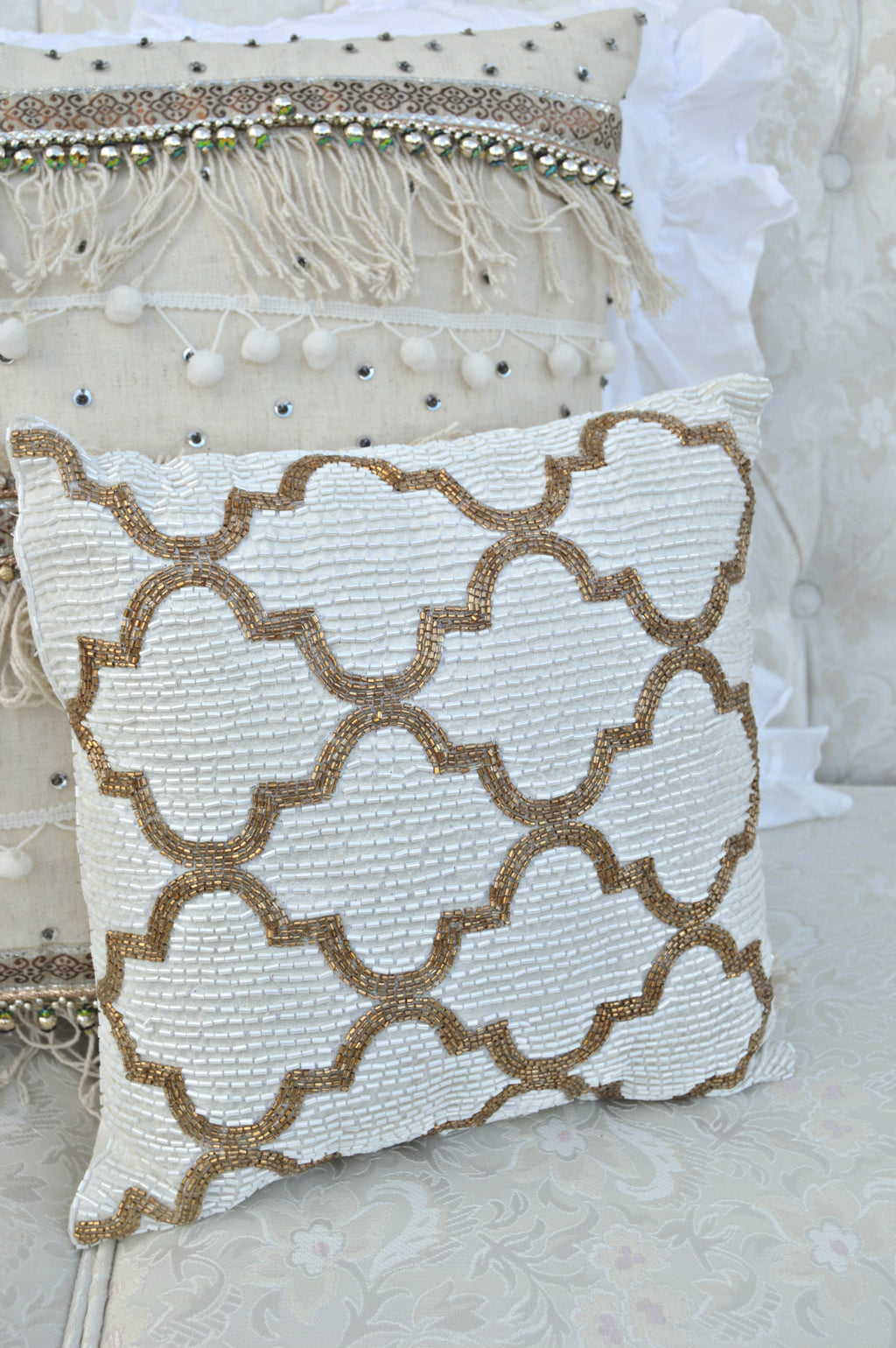 Bronze and ivory beaded pillow