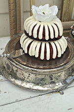 Vintage silver cake stand with bundt cake