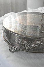 Round silver vintage cake stand with rose pattern