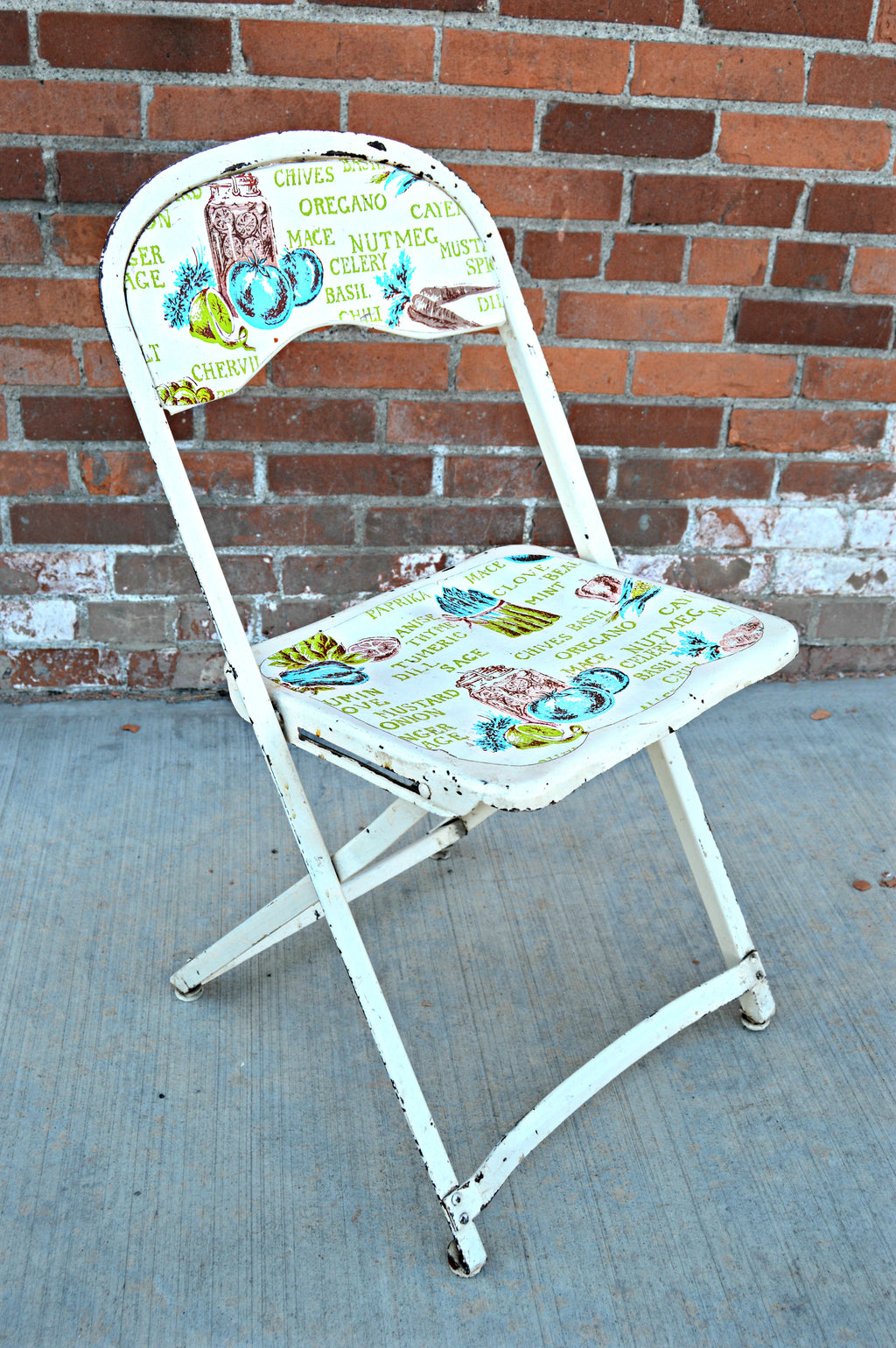 Antique metal chairs in white and cooking spice print