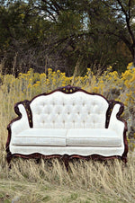 Elegant ivory vintage love seat