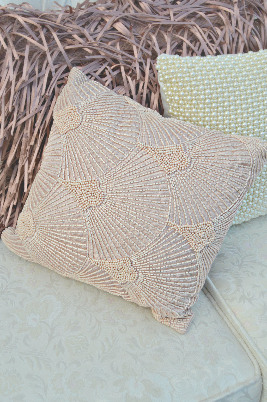 Pink beaded embellished pillow