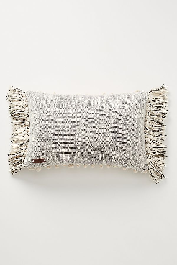Cream and black pillow with fringe