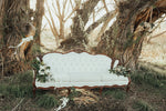 Elegant ivory vintage sofa outdoors