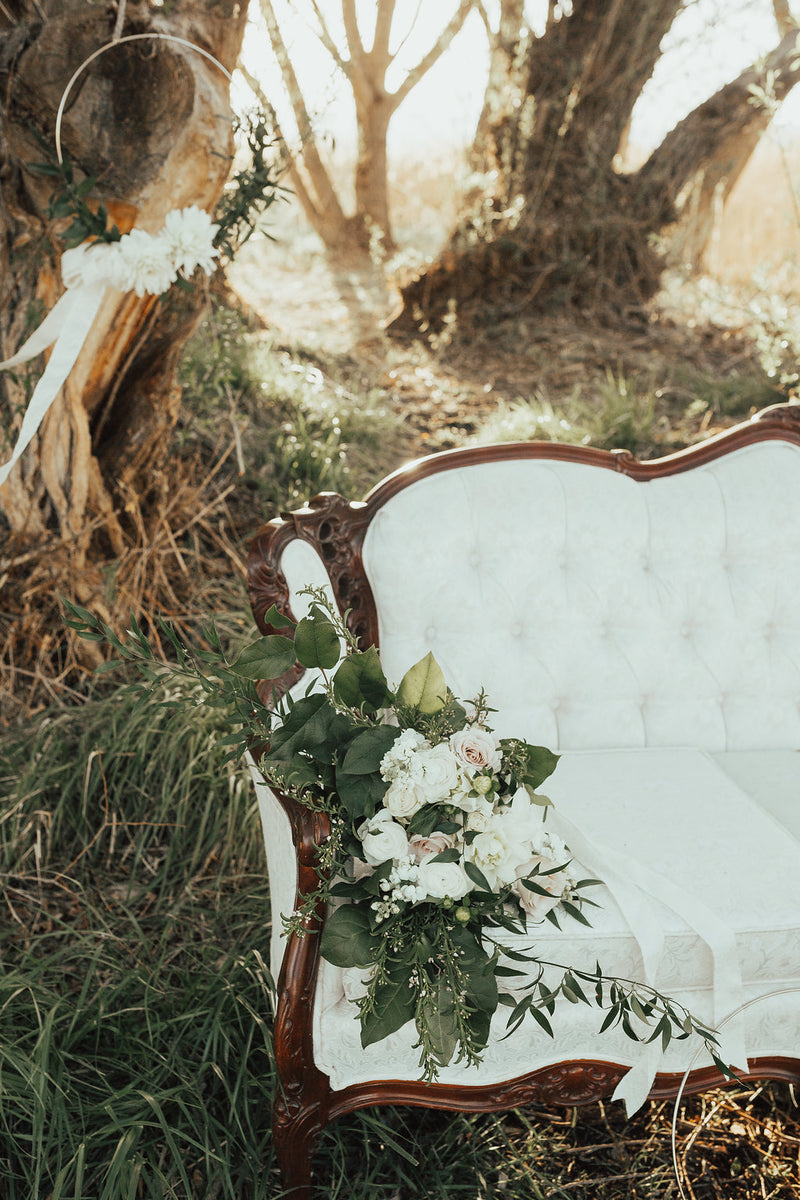 Elegant ivory vintage sofa outdoor wedding decor