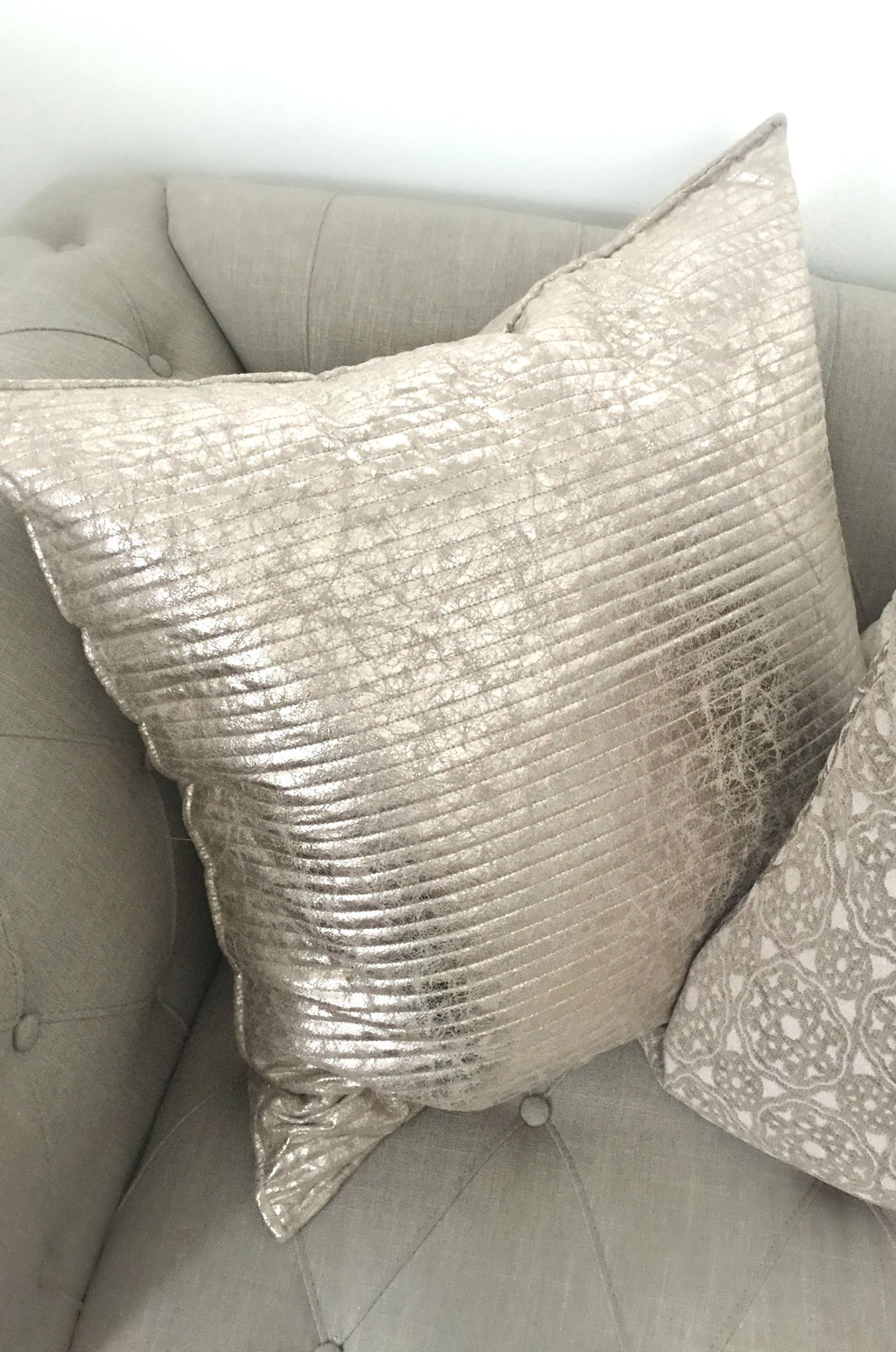Shimmery silver decorative pillow