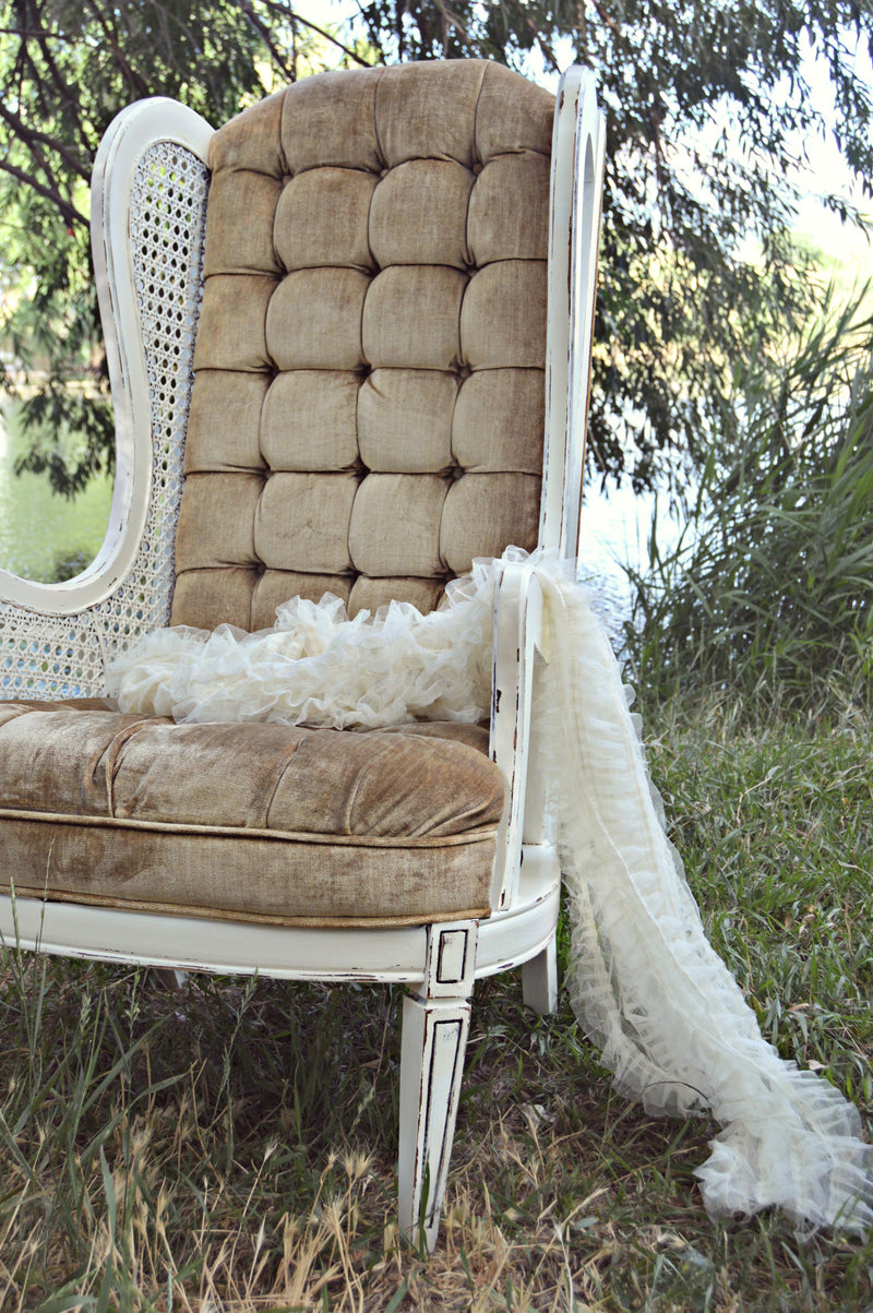 Vintage tan wing-back chair