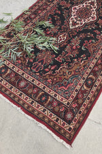Red bohemian rug