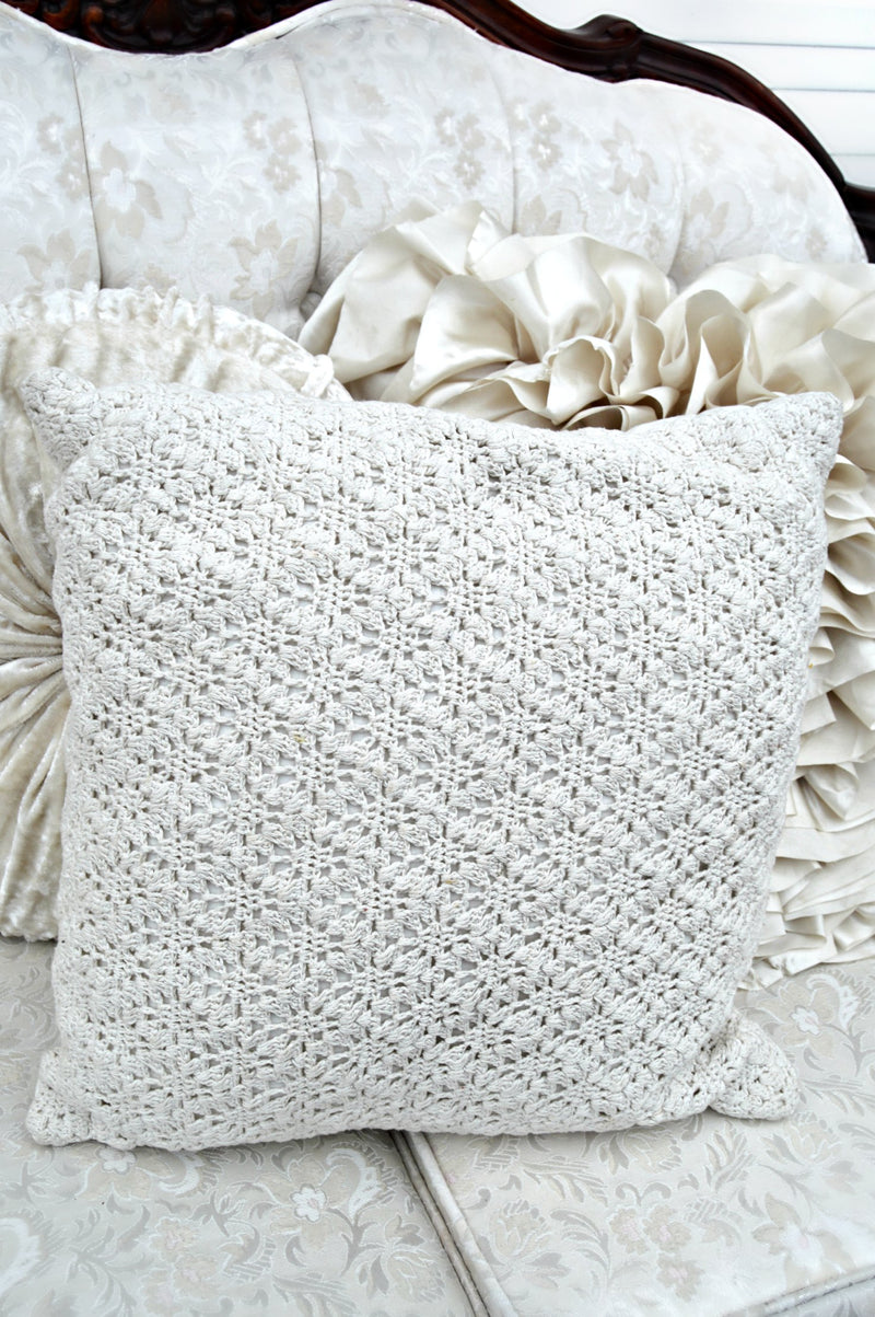 Cream crochet pillow